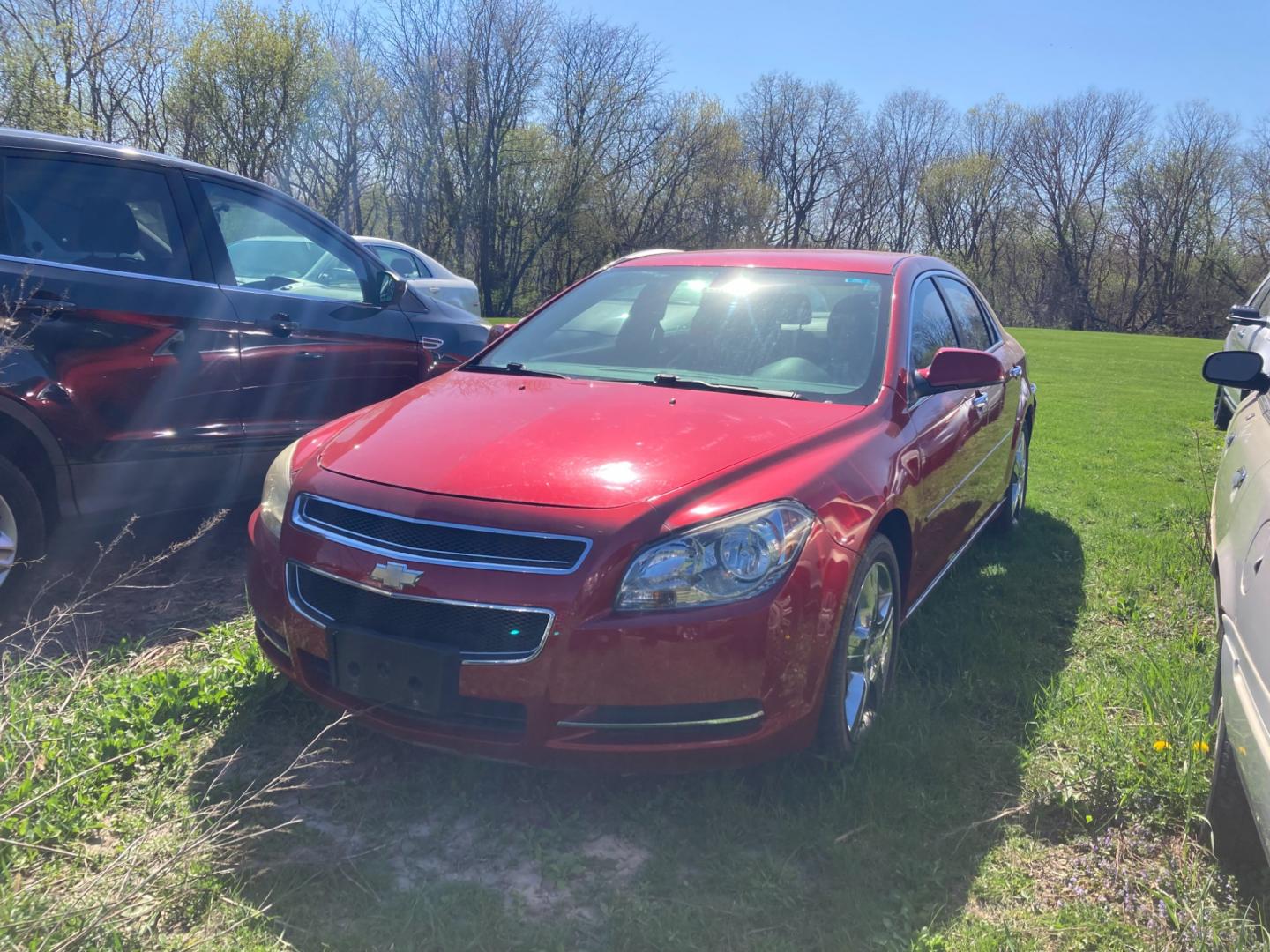 2012 Firethorn Red Met Chevrolet Malibu 1LT (1G1ZC5E02CF) with an 2.4L L4 DOHC 16V engine, 6-Speed Automatic transmission, located at 1800 South Ihm Blvd, Freeport, IL, 61032, (815) 232-5543, 42.278645, -89.607994 - Malibu LT 4D Sedan - Photo#0